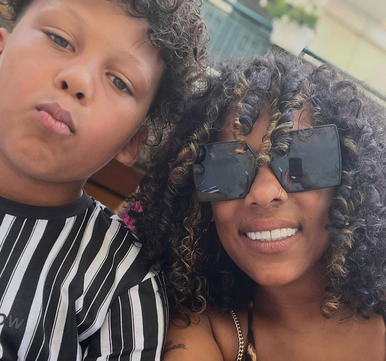 Cherrelle with family — 2 of a Kind Cleaning Academy
