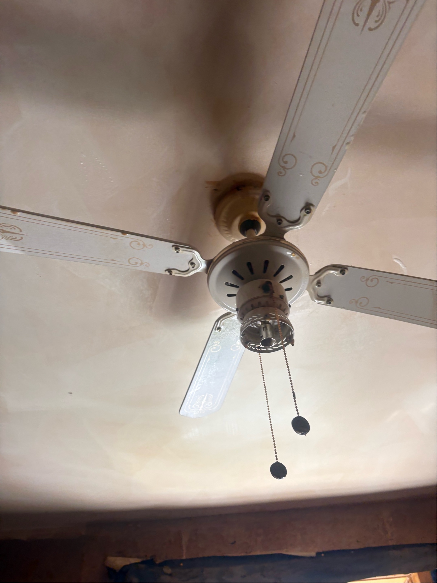 Nicotine-coated ceiling fan — heavy contamination
