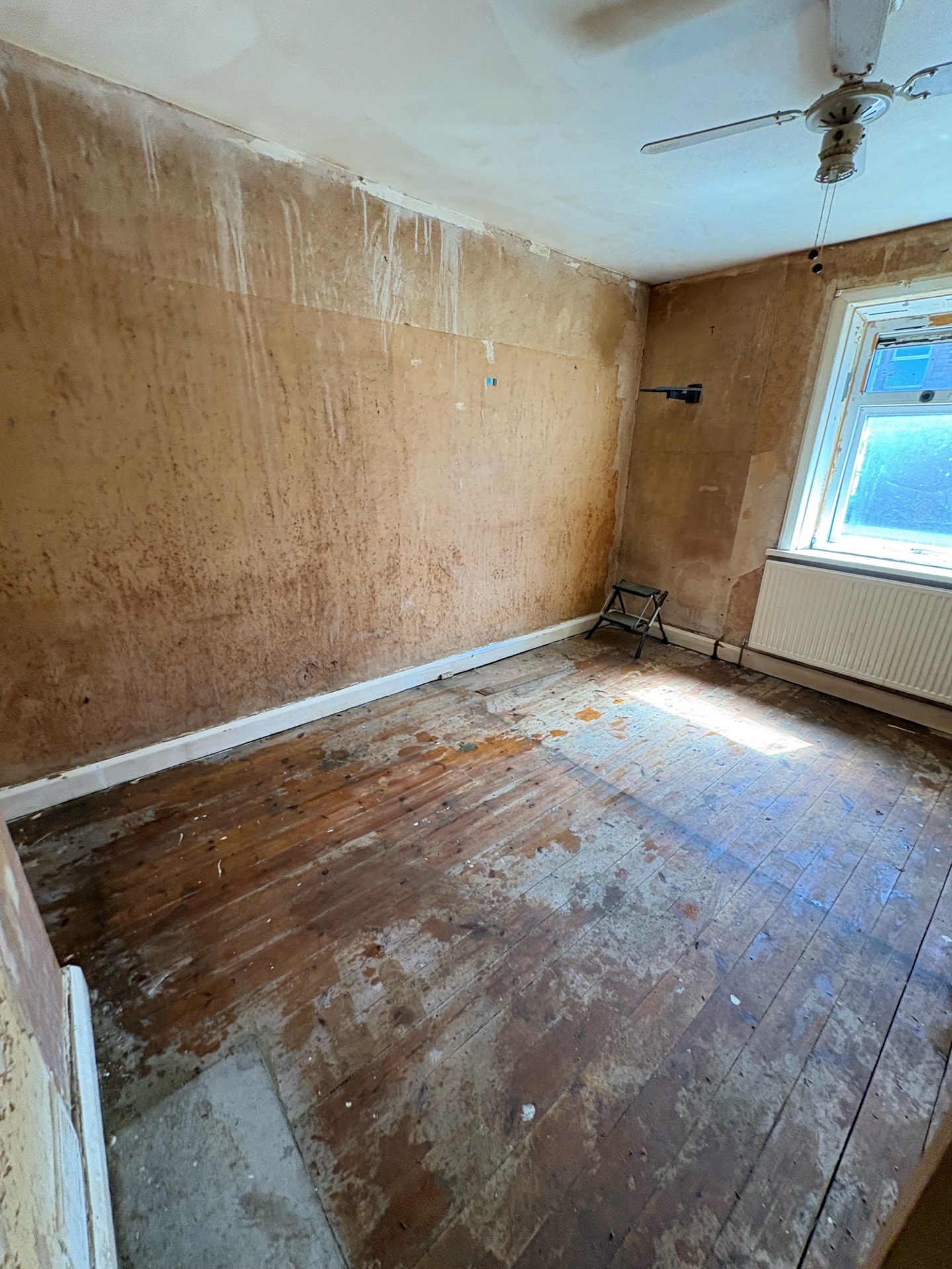 Stripped walls revealing nicotine penetration